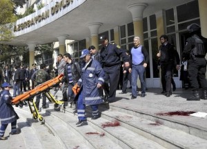 Conflicting identity: According to official sources, (pictured is) the victim of the shooting inside the Azerbaijan Oil Academy in Baku. Other sources, however, say this might be the other attacker who according to some eyewitnesses was wearing a cap and a jacket. Russiatoday.com has also posted a video on their website identifying the same person as 'terrorist'. (Getty Images)