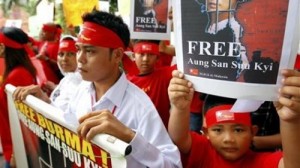 Protestors outside the Burmese embassy in Kuala Lumpur, Malaysia, demand the release of Daw Aung San Suu Kyi (Vincent Thain / AP)