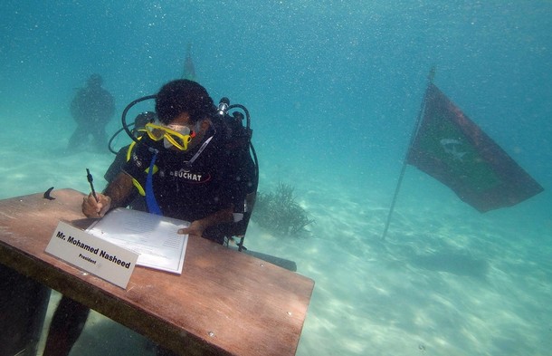 The President of Maldives, Mohammed Nasheed, signed the cabinet declaration to conclude the 30 minutes long cabinet meeting. The 42-year-old former journalist is also a certified diver.