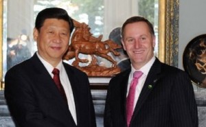 Chinese Vice President Xi Jinping shakes hands with New Zealand Prime Minister John Key in Auckland, New Zealand, on June 18, 2010. (Rao Aimin/Xinhua)