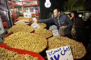 A vendor in Tehran, Iran, February 2, 2012 (AP)