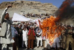 Afghan protest in response to the burning of Korans by American forces (Rahmat Gul/AP)