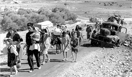 Palestinian refugees fleeing Galilee, 1948. Palestine was ethnically cleansed by Zionist forces from 1947-1949. (Photo: Fred Csasznik)
