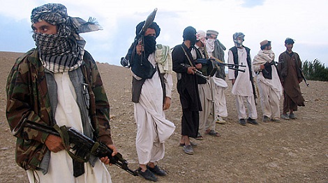 Taliban fighters on a hillside at Maydan Shahr in Wardak province, west of Kabul. (AFP/Getty)