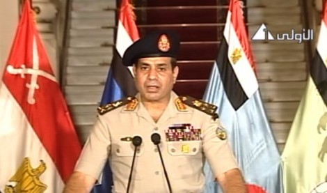 Egyptian Defense Minister Abdelfatah al-Sissi on Egyptian state TV delivering a statement on July 3, 2013. The military issued President Morsi an ultimatum before deposing him in a coup.