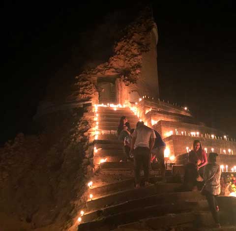 Candle lighting at Dharahara ruins on the anniversary of the quake that fell Nepal’s tallest spire (Photo: Alonzo Lyons)