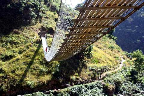 Swinging bridges are common in rural Nepal (Photo: Alonzo Lyons)