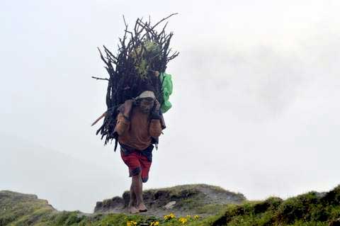 Barefoot porter in the highlands of Nepal (Photo: Alonzo Lyons)