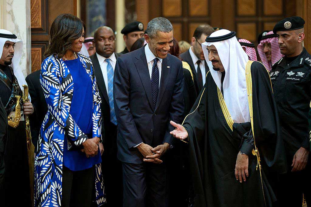 President Barack Obama and First Lady Michelle Obama walk with King Salman bin Abdulaziz of Saudi Arabia at Erga Palace in Riyadh, Saudi Arabia, Jan. 27, 2015. (Pete Souza/White House)