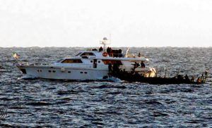 An image released by the Israel Defence Forces shows Israeli soldiers boarding the Irish vessel the MV Saoirse, which was carrying activists towards Gaza .