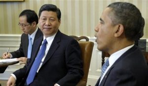 Chinese Vice President Xi Jinping meets with U.S. President Barack Obama in the Oval Office on February 14, 2012. (Susan Walsh/AP)