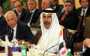 Arab League Secretary General Nabil Alarabi and Qatari Foreign Minister Hamad bin Jasim attend the Arab Foreign Ministers emergency meeting about Syria in Cairo, November 2011 (Khaled Elfiqi/EPA)