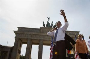 US President Barack Obama with German Chancellor Angela Merkel at the Brandenburg Gate in Berlin, Wednesday, June 19, 2013 (Evan Vucci/AP)