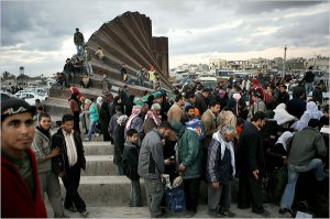 Palestinians breach the wall between the Gaza Strip and Egypt, January 23, 2008 (Kevin Frayer/AP)