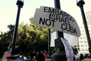 A sign protesting the embargo of Cuba at the Occupy Oakland protests, November 2, 2011 (Photo: Nathan Jongewaard/Flickr)