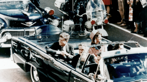 President Kennedy in the limousine in Dallas, Texas, on Main Street, minutes before the assassination on November 22, 1963 (Walt Cisco/Dallas Morning News)