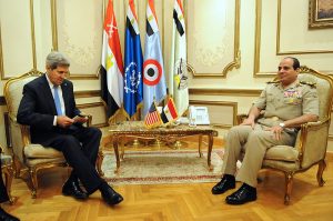 U.S. Secretary of State John Kerry meeting with Egyptian Minister of Defense General Abdul Fatah Khalil al-Sisi in Cairo, Egypt, on November 3, 2013. Sisi took power in a coup d'etat supported by the US, which also provides over $1 billion in military aid to Egypt annually. (State Department)