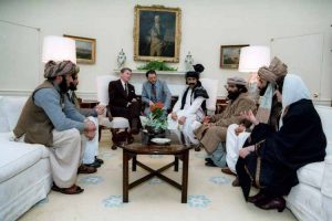 US President Ronald Reagan meeting with Afghan Mujahedeen, who he called "freedom fighters", in the Oval Office on February 2, 1983. (Ronald Reagan Library)