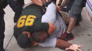 A police thug murdered Eric Garner by placing him in a chokehold at about 4:45 pm on July 17, 2014. The murder was caught on video by Ramsey Orta.