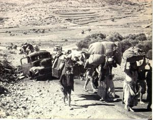 Palestinian refugees fleeing their homes in 1948. This photo was used for the cover of Israeli historian Benny Morris's book The Birth of the Palestinian Refugee Problem, 1947-1949. (Public domain).