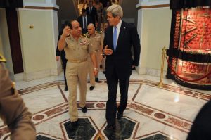 Egyptian Minister of Defense General Abdul Fatah Khalil al-Sisi bids farewell to U.S. Secretary of State John Kerry after a meeting in Cairo, Egypt on November 3, 2013. (US Department of State)