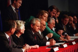 President Slobodan Milosevic of the Federal Republic of Yugoslavia, President Alija Izetbegovic of the Republic of Bosnia and Herzegovina, and President Franjo Tudjman of the Republic of Croatia initial the Dayton Peace Accords on December 14, 1995 (Brian Schlumbohm/US Air Force)