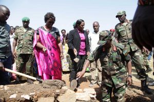 Army chief of staff Major General Frank Mushyo Kamanzi lays a foundation stone for a health center in Mubare, Rwanda (Rwanda Government)