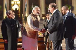 Indian Prime Minister Narendra Modi shakes hands with Pakistani Prime Minister Nawaz Sharif at a meeting on May 30, 2014. (Narendra Modi)