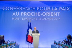 French President Francois Hollande addresses his guests on January 15, 2017, at the Ministry of Foreign Affairs Conference Center in Paris, France, at the outset of a French-hosted conference on Middle East peace attended by US Secretary of State John Kerry. (US State Department/Public Domain)