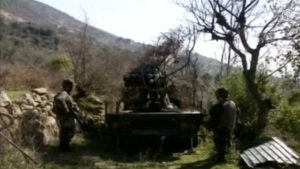 Hezbollah fighters standing by a Katyusha rocket launcher (CC BY 3.0)