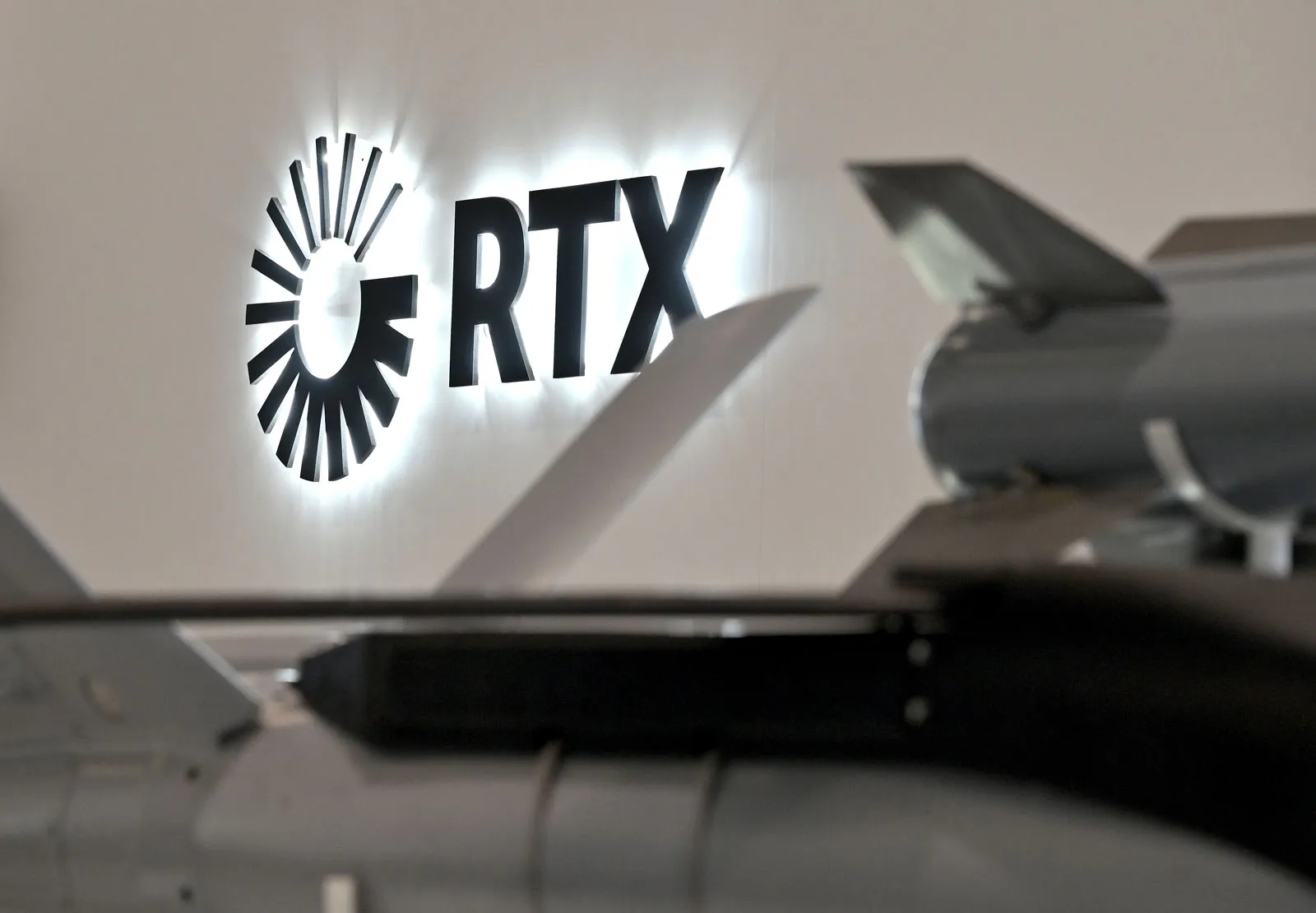 RTX, Wells Fargo (WFC) And Amgen (AMGN) Face Mixed Outlooks As Analysts Weigh Growth Against Key Risks