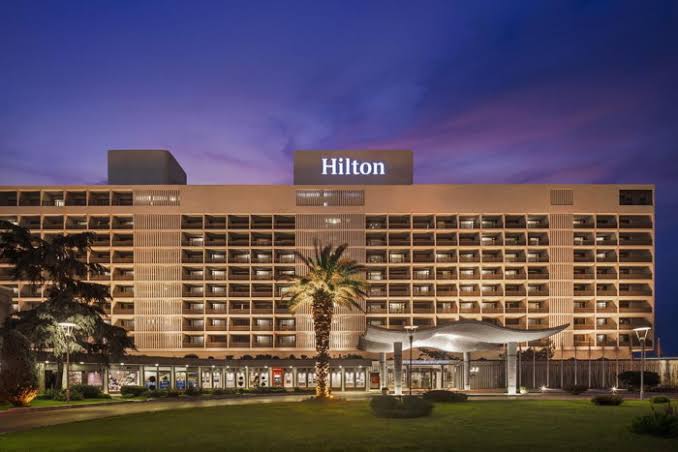 Hilton (NYSE: HLT) Shares Slide 5% As Revenue Miss And Soft Q4 Outlook Overshadow Profit Beat